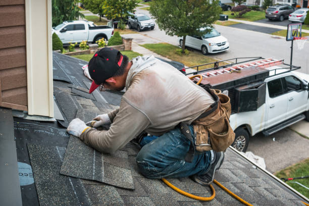 Professional Roofing technician working in Hawley, PA